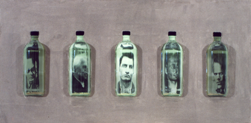 Sand-coated box with bottles filled with water, images and internal lighting, 60 x 30 x 20 cm, 1994.